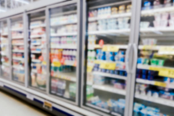 istock Commercial refrigerators in a large supermarket blurred background 866575978