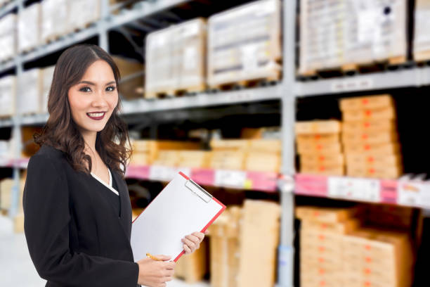 istock Businesswoman checking list order on a warehouse 866578874