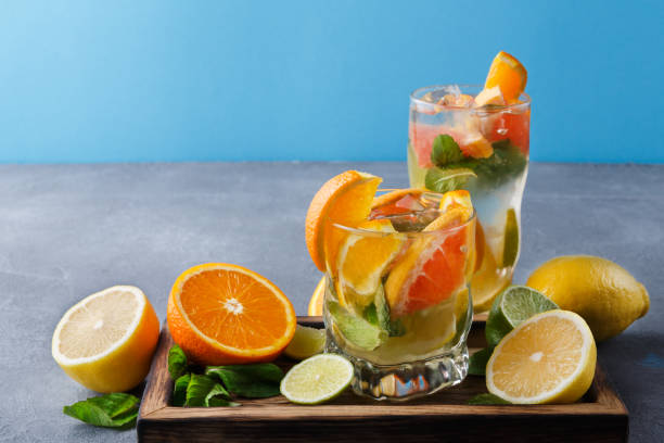istock Colorful summer background with citrus drinks and fruits 866579742