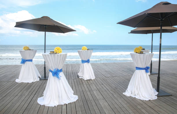 Bar tables decorated for party or wedding with ocean view