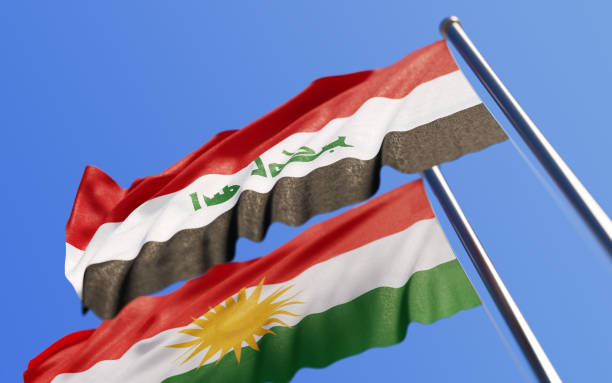 istock Iraqi And Kurdish Flags Waving With Wind On Blue Sky 866601040