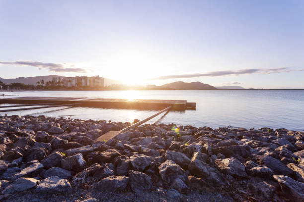 istock beautiful rocky beach at sunrise 866601644