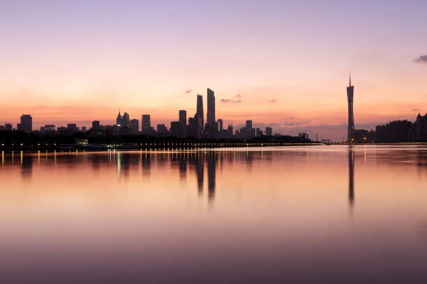 istock modern buildings near water in modern city 866602374
