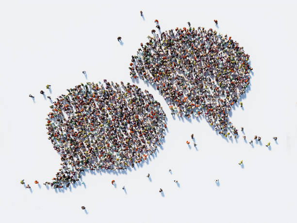 Human Crowd Forming A Big Speech Bubble: Communication And Social Media Concept Human crowd forming a big speech bubble on white background. Horizontal composition with copy space. Clipping path is included. Communication And Social Media Concept crowdsourcing stock pictures, royalty-free photos & images