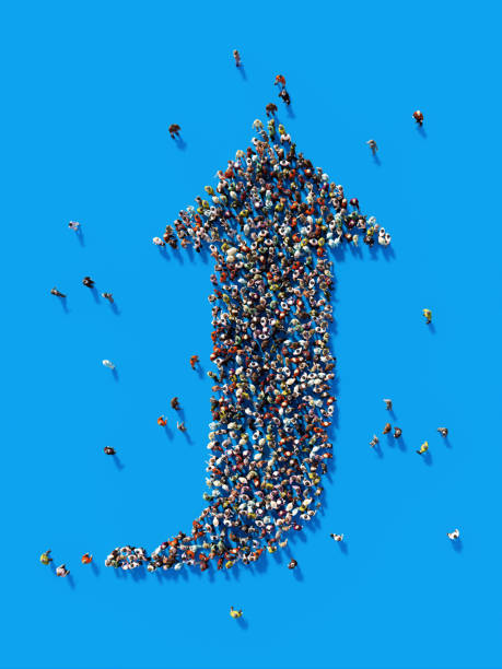 istock Human Crowd Forming An Up Arrow: US Dollar and Crowdfunding Concept 866608586