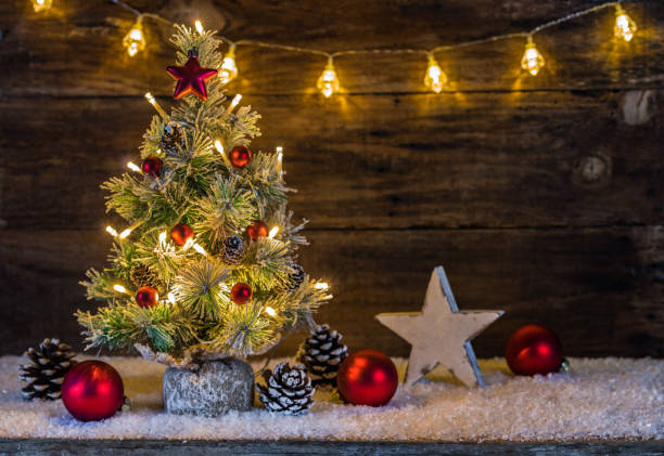 istock Christmas background with festive illuminated Christmas tree and ornaments 866612730