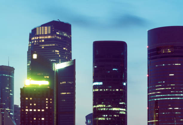 istock high section of modern skyscrapers against sky 866615620