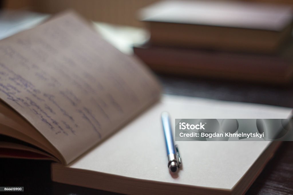 Open Notepad Book Open Notepad With Handwritten Notes With Blue Pen Books In The ...