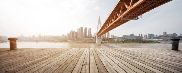istock empty marble floor with modern bridge and buildings 866616084