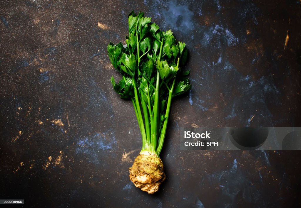 Root Celery With Green Stems Stock Photo - Download Image Now - Celeriac,  Agriculture, Backgrounds - iStock