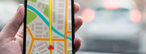 istock GPS Navigation on Mobile Phone Device and Transportation Concept. Male Hand Using Navigation System Map Tracking on Smartphone with Copy Space. 866621116