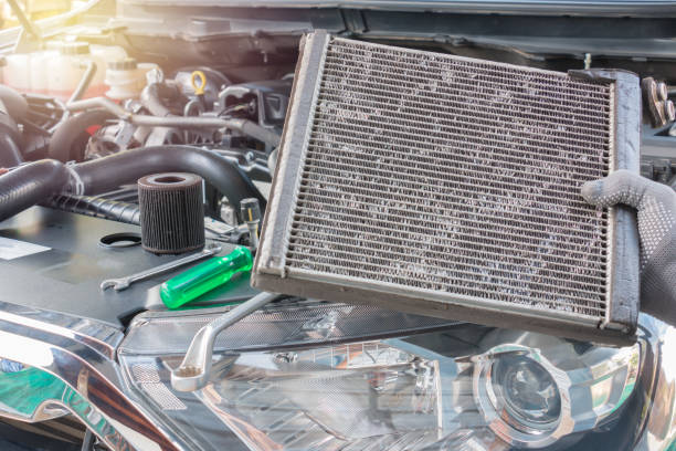 istock Car mechanic is Changing radiator 866622300