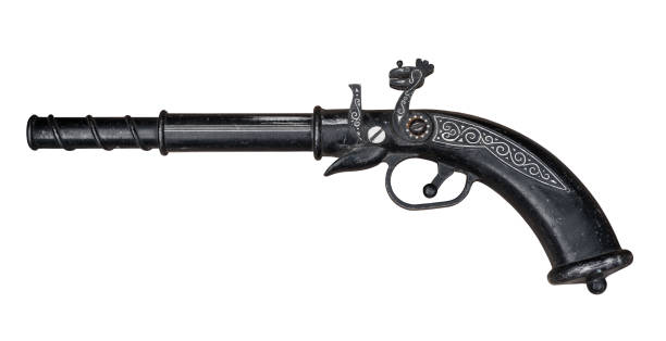 Old metal pistol Old metal pistol isolated. Clipping path included rifle old fashioned antique ancient stock pictures, royalty-free photos & images