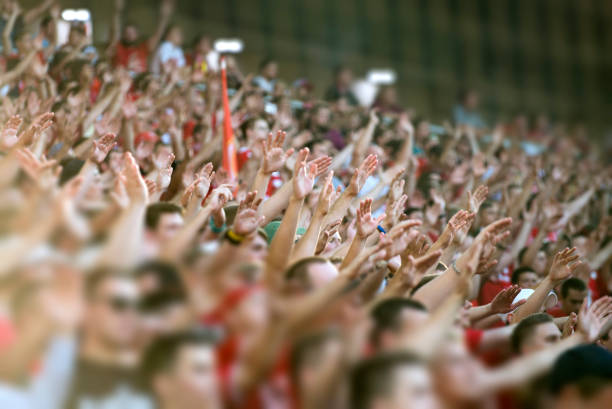 Crowd clapping on the podium of the stadium Crowd clapping on the podium of the stadium fan enthusiast stock pictures, royalty-free photos & images