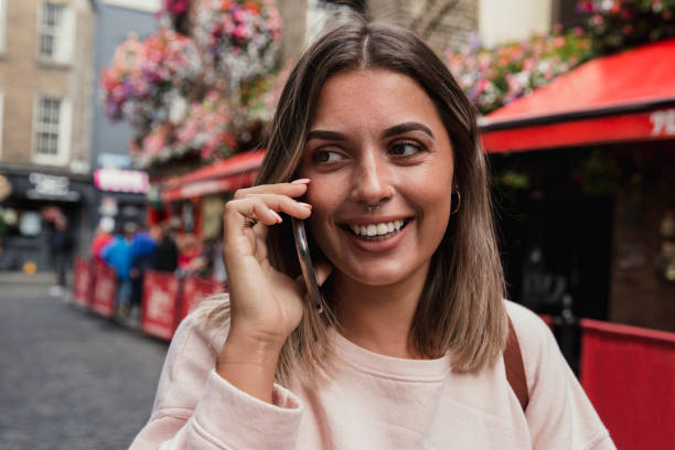 istock Young female outside public house Dublin 866630192