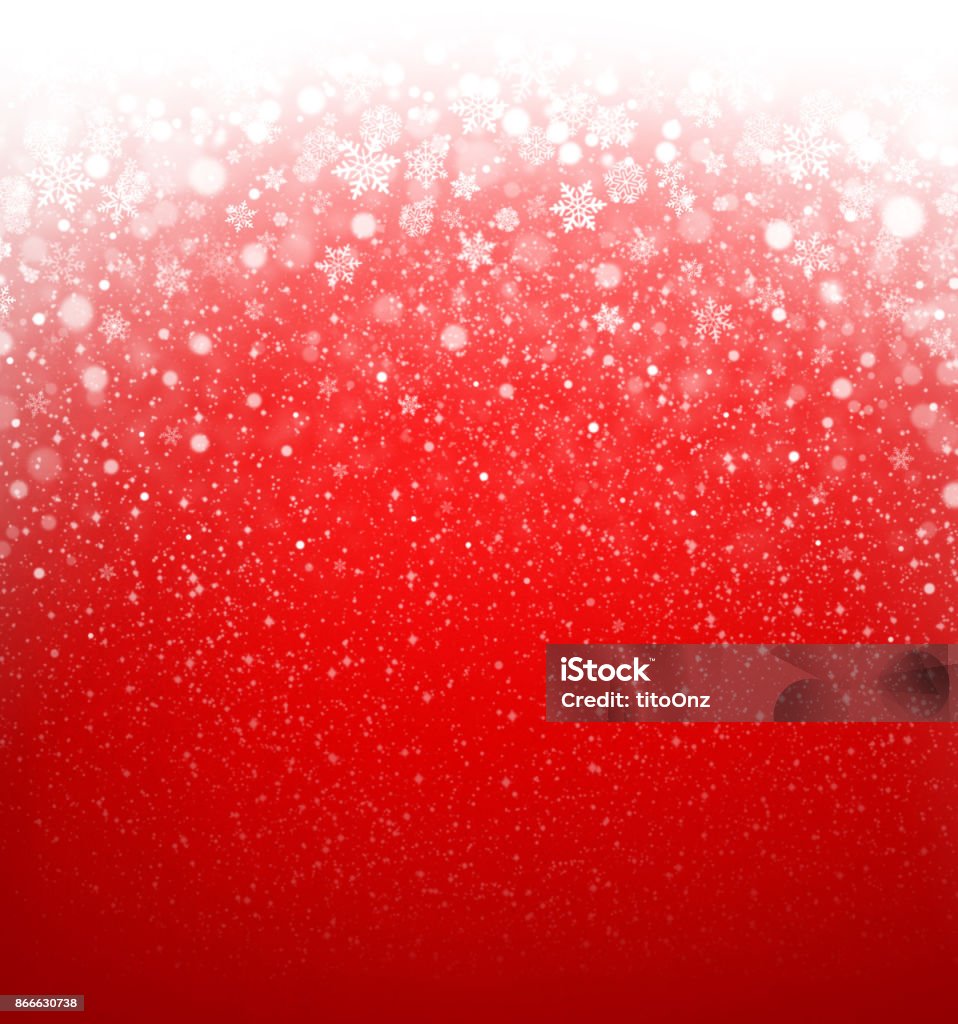 Snowfall on red Snowflakes shapes and snowfall on a frozen Christmas red background - Winter material Backgrounds Stock Photo