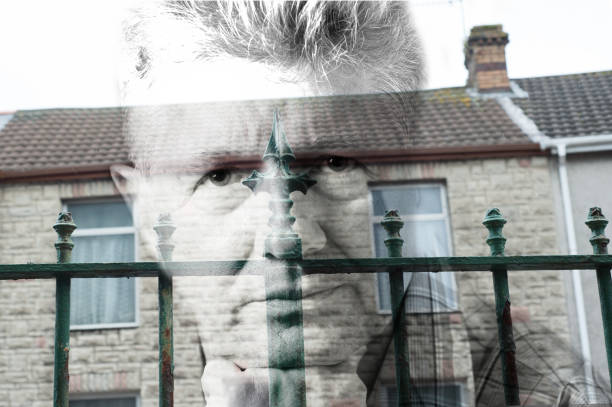 Senior man against urban UK background