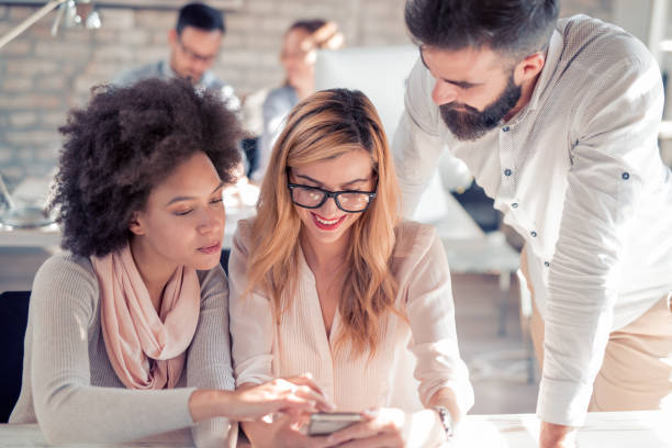 istock Group of young designers working on a new project 866636196