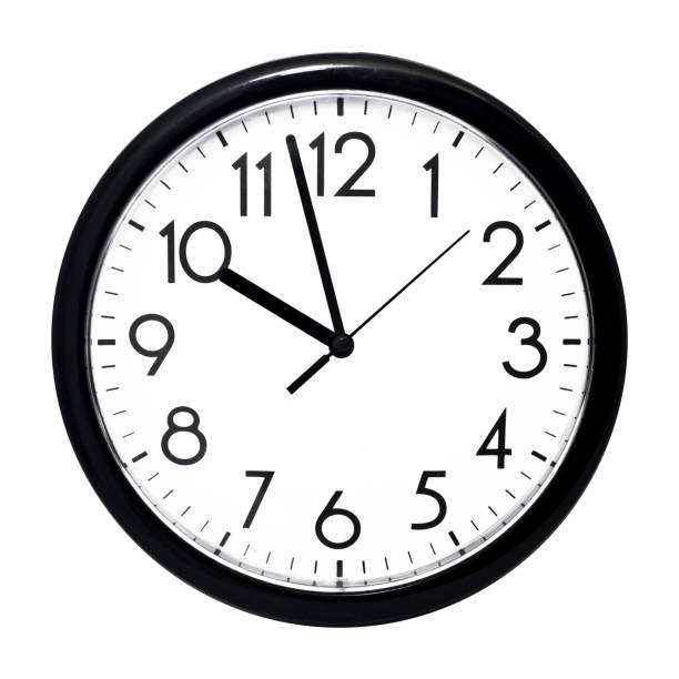 White wall clock. Isolated on white background. White wall clock. Isolated on white background. High quality photo. clock wall clock face clock hand stock pictures, royalty-free photos & images