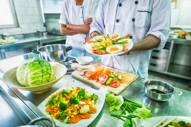 istock Chef preparing salad in chinese restaurant 866644032