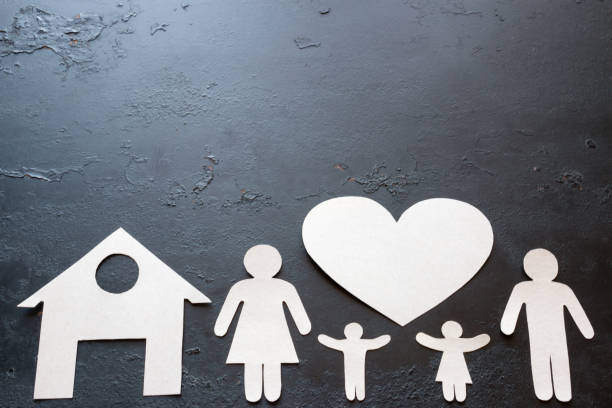 istock paper family on a black background with space for text 866656034