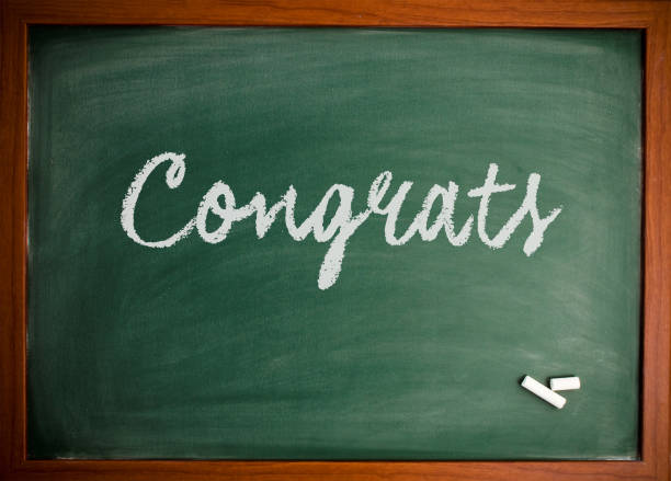 istock Congrats  - Motivational quote on blackboard 866656602