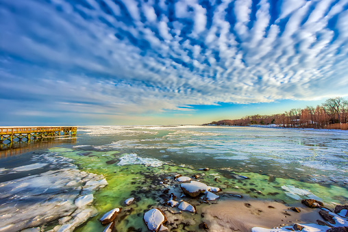 Fishing pier on an icy Chesapeake Bay in late Autumn