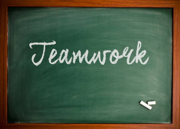 istock Teamwork  - Motivational quote on blackboard 866661224