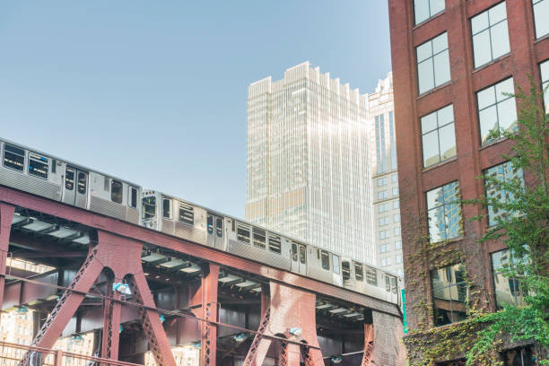 istock Downtown Urban Chicago Illinois Buildings with Elevated L Train 866661578