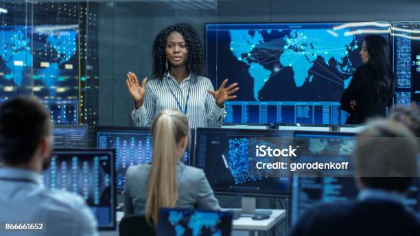 Chief Project Engineer Holds Briefing For A Team Of Scientists That Are Building Machine Learning System Displays Show Working Model Of Neural Network Stock Photo - Download Image Now