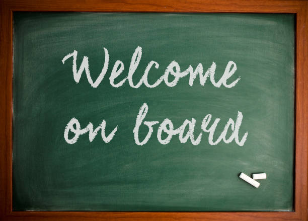 istock Welcome on board  - Motivational quote on blackboard 866666720