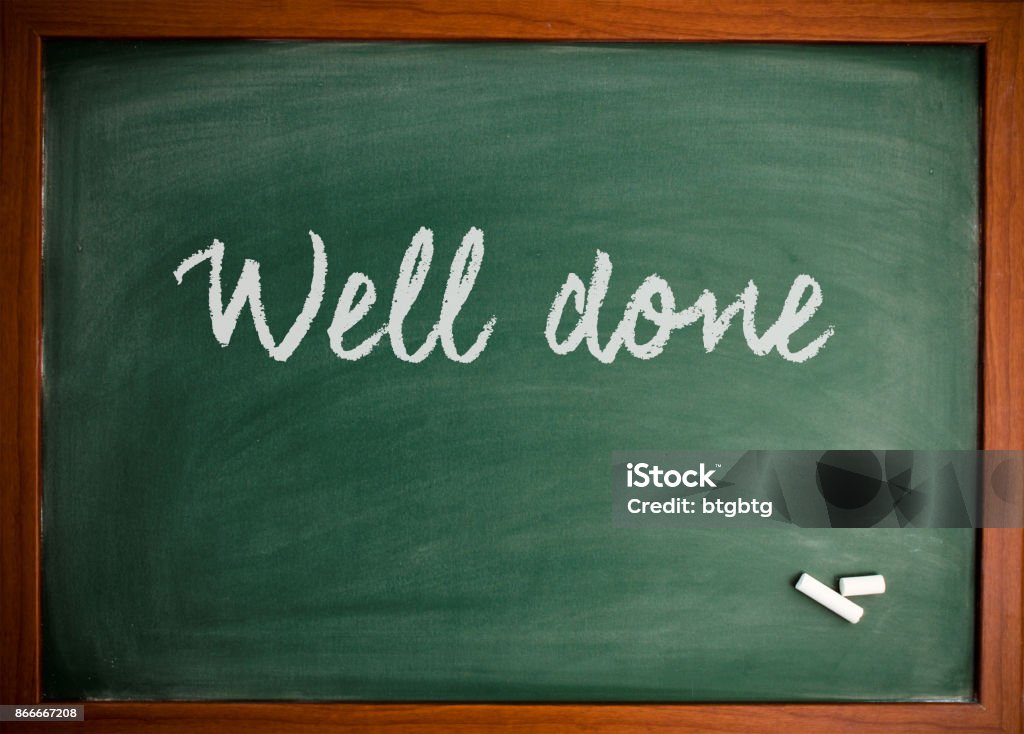 Well done  - Motivational quote on blackboard Handwriting Motivational/Business Quote on Chalkboard Business Stock Photo