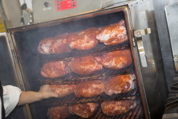 istock A professional chef checks his smoked meats 866667474
