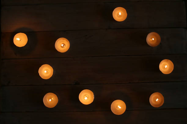 Burning candles  in the darkness.