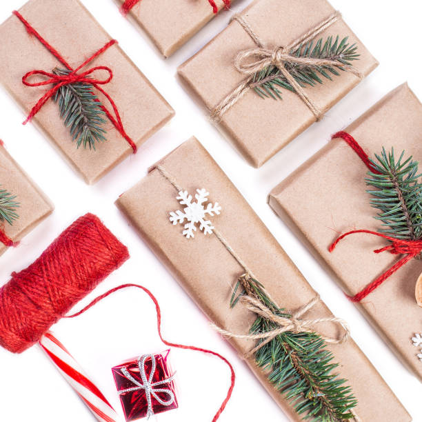 istock Christmas composition. Festive gift boxes collection with decorations and pine tree for design on white background. 