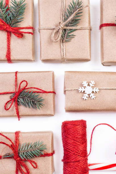 istock Christmas composition. Festive gift boxes collection with decorations and pine tree for design on white background. 