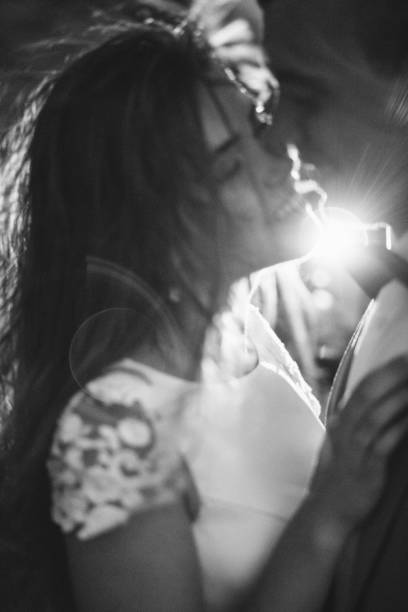 istock Romantic couple standing together holding hands in the mountains 866680680