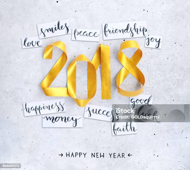 New Years Handwritten Wishes On Strips Of White Paper Lying On A Concrete Background Stock Photo - Download Image Now