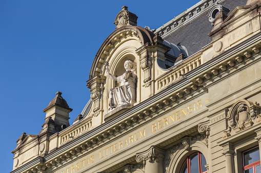 Bern, Switzerland - 2 November, 2014: upper part of the building of the University of Bern, above the entrance to it. The University of Bern is a university in the city of Bern, founded in 1834.
