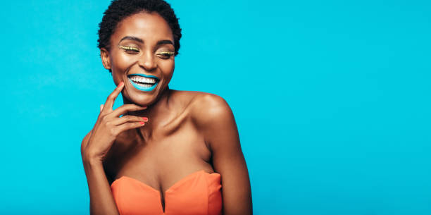 istock Beautiful smiling woman with vivid makeup 866696152
