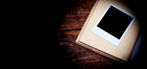 istock Open photo album with photo frame 866706078