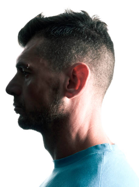 istock Profile of a man, lit from behind 866706816