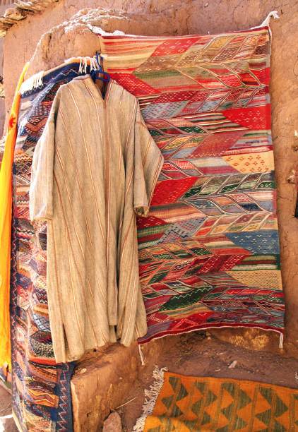 istock Traditional Moroccan clothing djellaba, souk Ait-Ben-Haddou Kasbah, Morocco 866706918