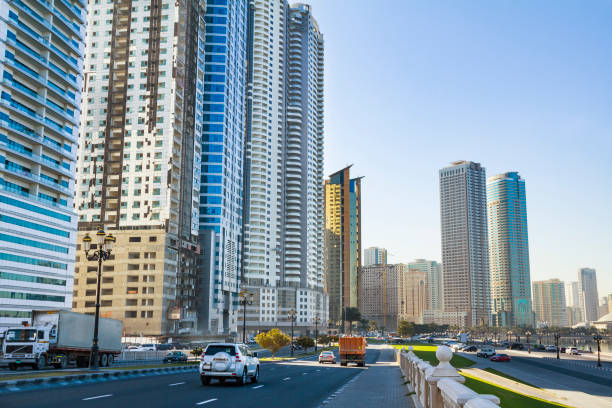 Buildings at Al Khan Corniche St., Sharjah View of some of the residential buildings around Al Khan Lagoon in Sharjah city emirate of sharjah stock pictures, royalty-free photos & images