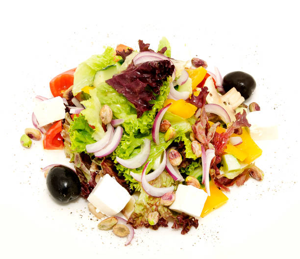 istock Greek salad on a white background 866718376