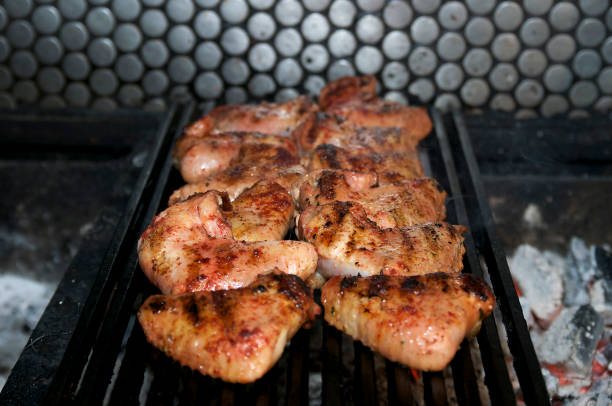 istock Grilled chicken wings on bbq 866718410