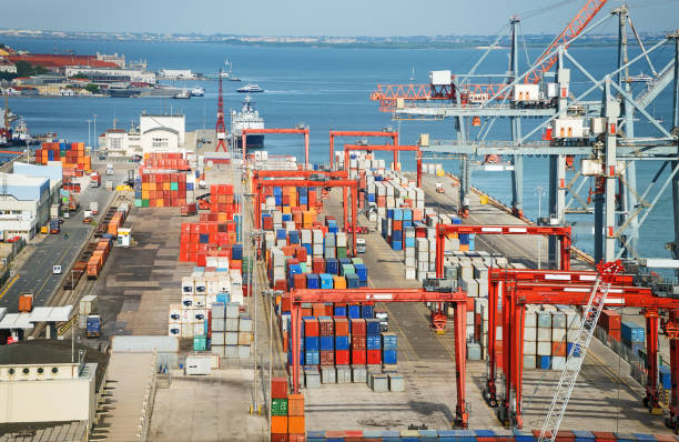 istock Industrial sea port with containers and cranes. 866721816