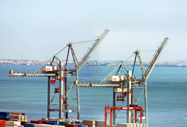 istock Industrial sea port with cranes and containers. 866721906