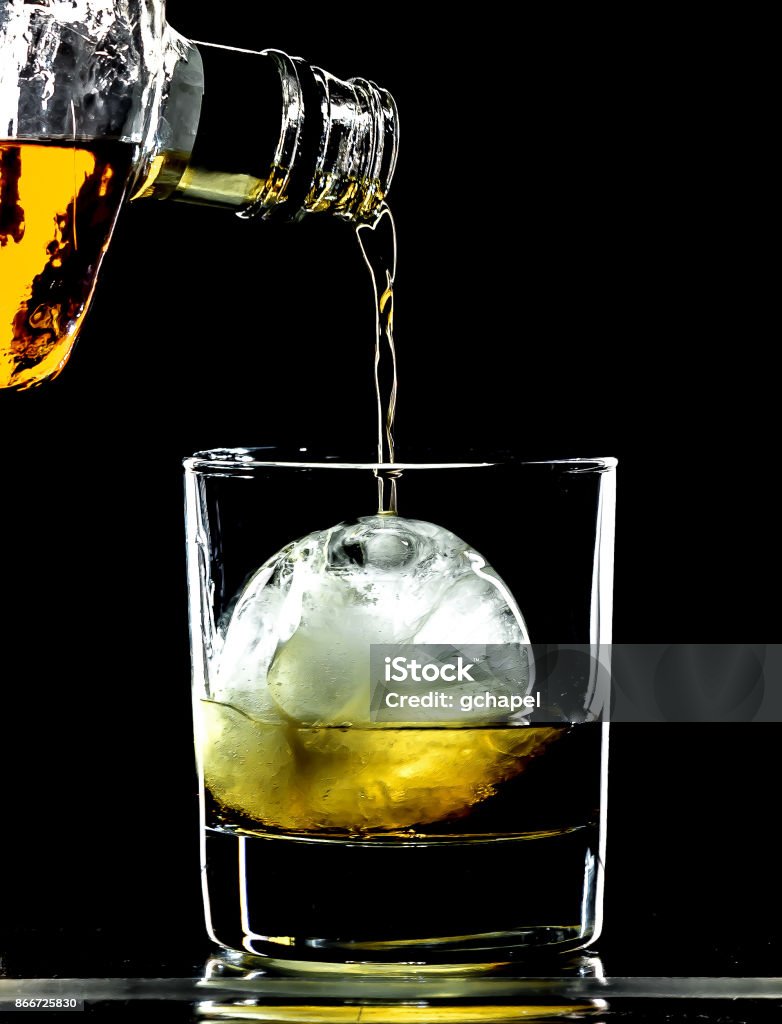 https://media.istockphoto.com/id/866725830/photo/round-spherical-ice-cube-ball-in-a-cocktail-glass-with-unique-rim-lighting-against-a-black.jpg?s=1024x1024&w=is&k=20&c=Fo24aWa_pGBni-YQ111UZNUn8oVgpxggBj9uuscfPYM=
