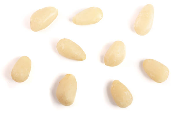 istock Shelled cedar pine nuts isolated on white background. top view 866735858
